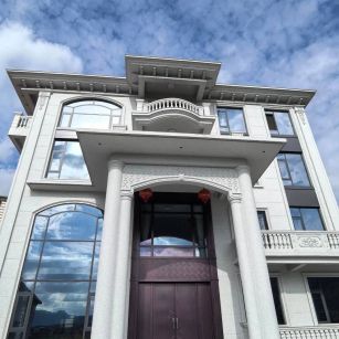 盐城白麻别墅外墙干挂石材效果示例