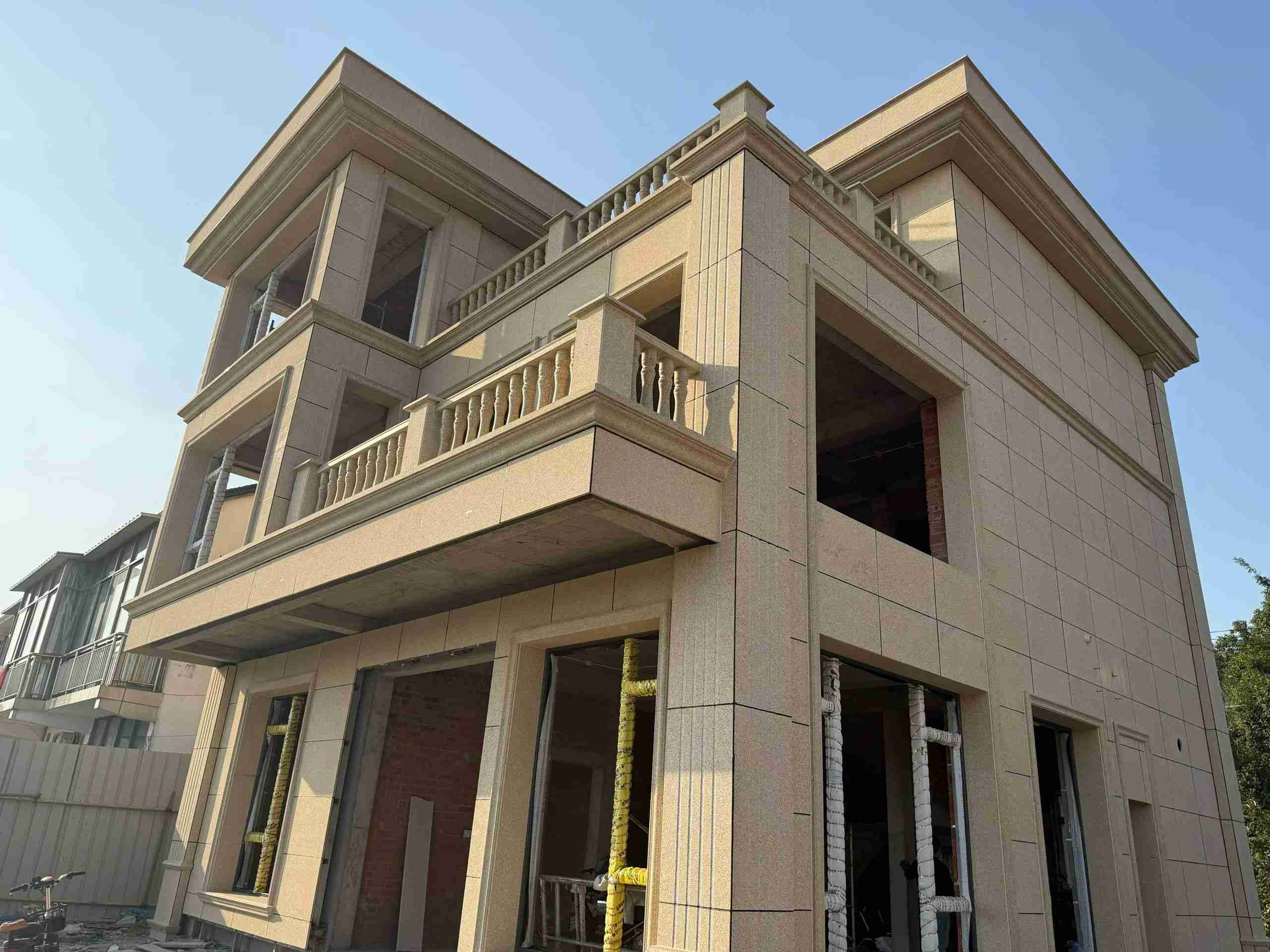 盐城 黄金麻花岗岩石材荔枝面外墙干挂效果展示